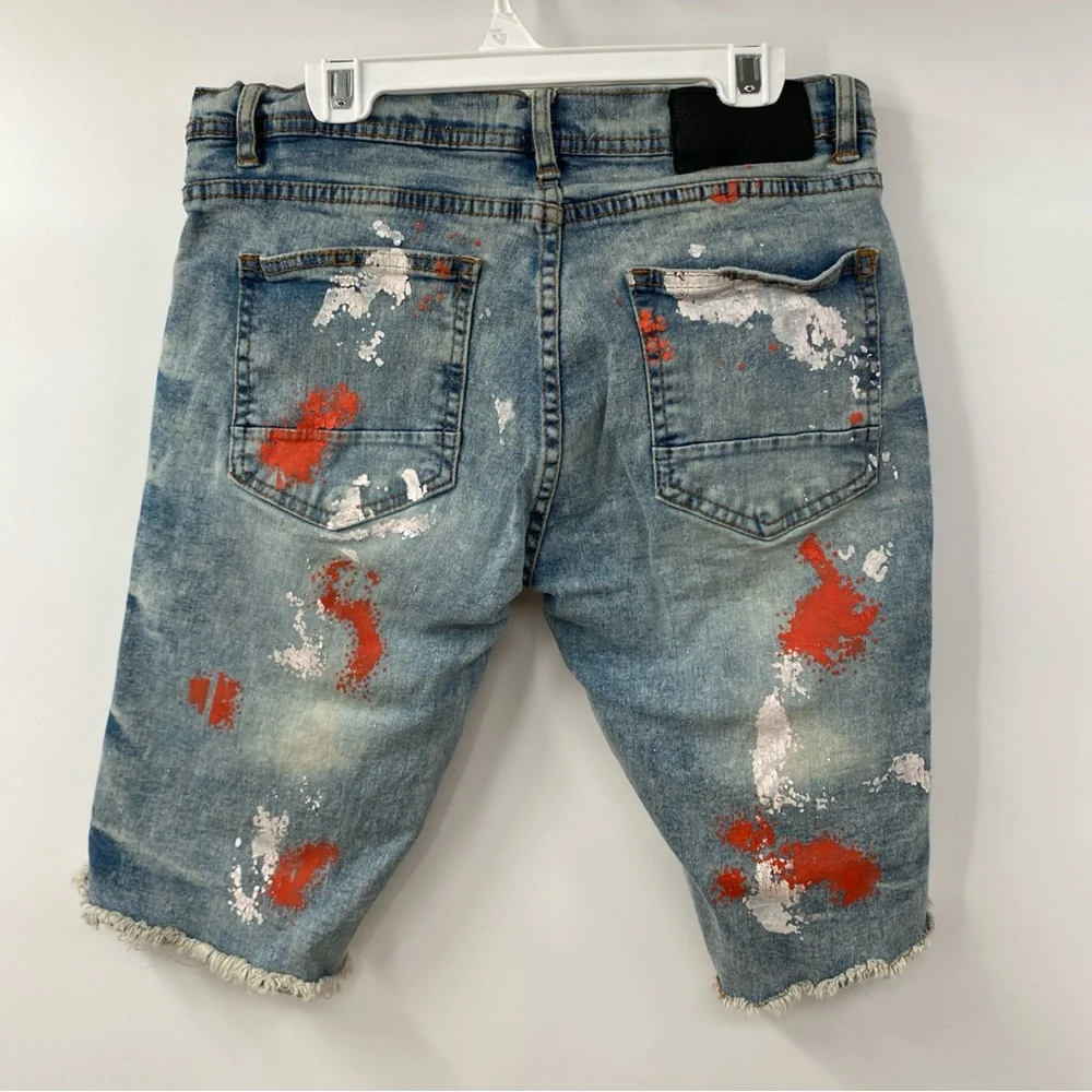 Distressed Paint-Splatter Men’s Denim Shorts in Blue with Red Accents